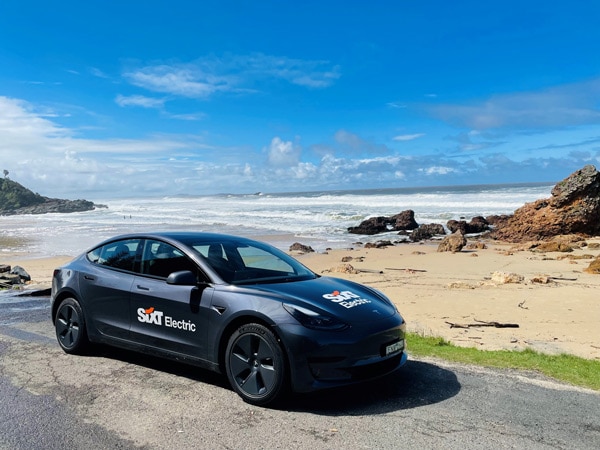 Sixt electric vehicle by the beach
