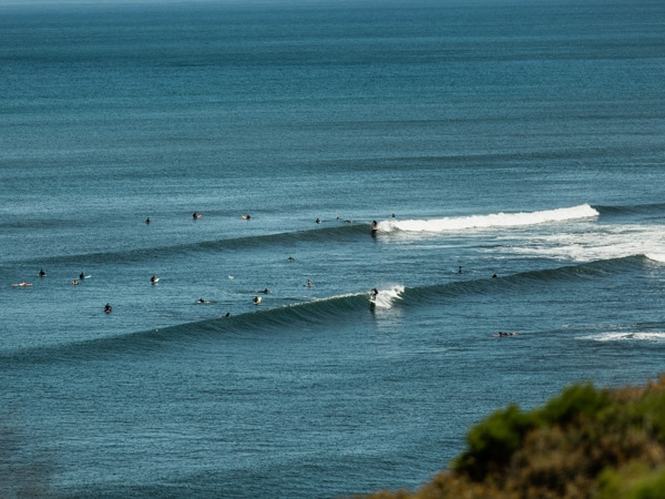 People surfing at Bells Beach in Victoria.