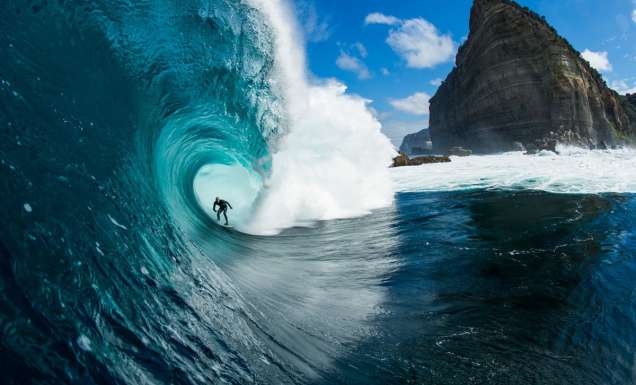 Surfer riding a wave at Shipstern Bluff