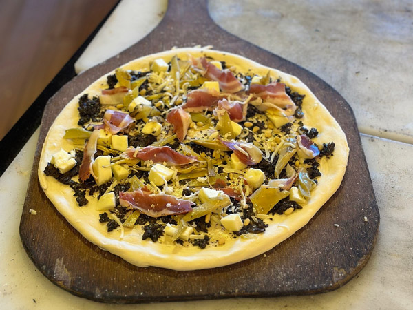 a wood-fired pizza at Jetty Cafe, Bruny Island