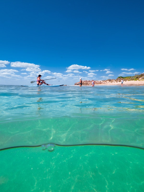 People canoeing at Long Beach in Robe