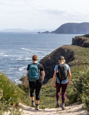 two hikers on a guided walking tour, Bruny Island