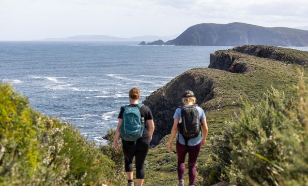two hikers on a guided walking tour, Bruny Island