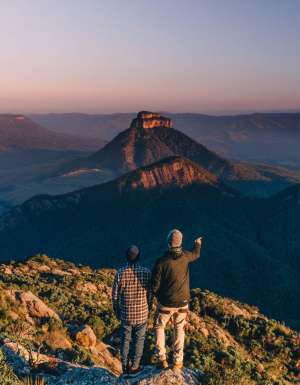 Two men at the top of Mount Barney after hike in Brisbane