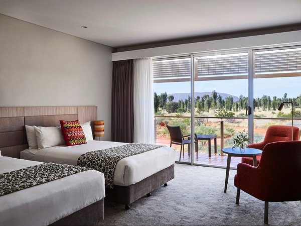 the interior of Desert Gardens Room with a balcony