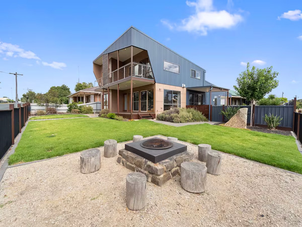 the exterior of Bendigo Lakeside accommodation with a bonfire setup