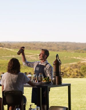 gin tasting with a view of the surrounding vineyards at Never Never Distillery, Mclaren Vale