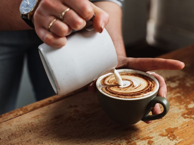 pouring milk over coffee at Willa, McLaren Vale