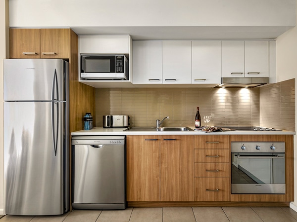 a kitchen complete with modern amenities