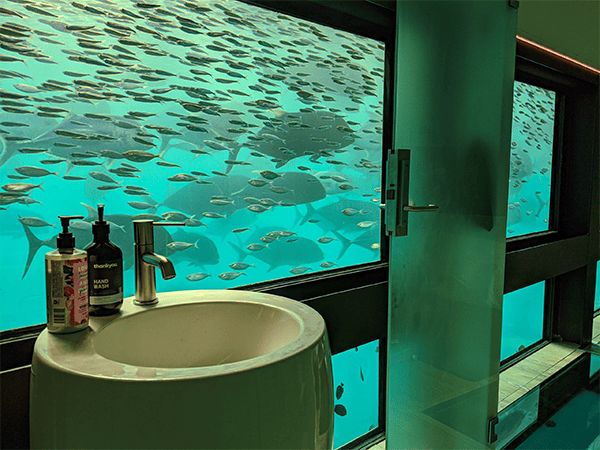 The bathroom in one of the Reef Suites rooms