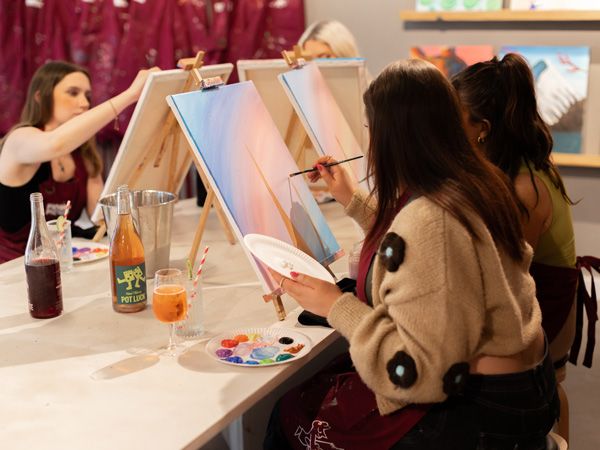 participants at a painting (and drinking) session at Pinot & Picasso Bendigo