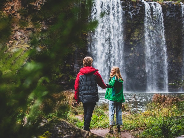 Couple enjoying a walk to the bottom of Dangar Falls, Dorrigo.