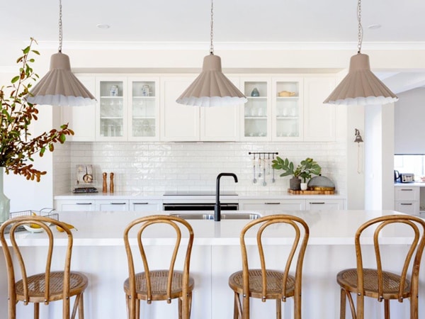 a modern kitchen interior with wooden chairs at Bridgewater