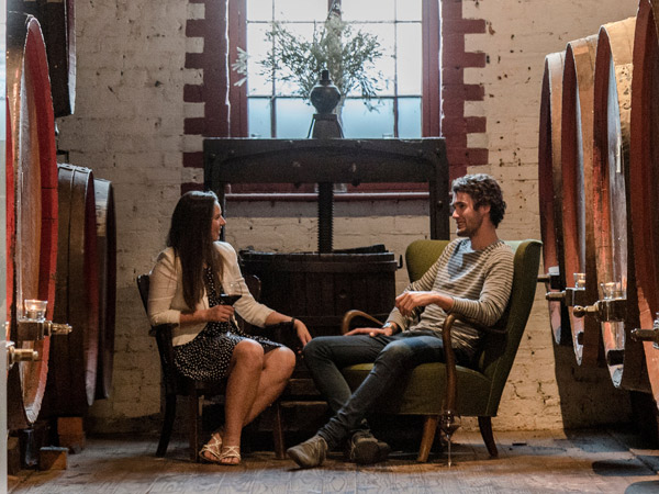 a couple enjoying wine tasting at Saltram