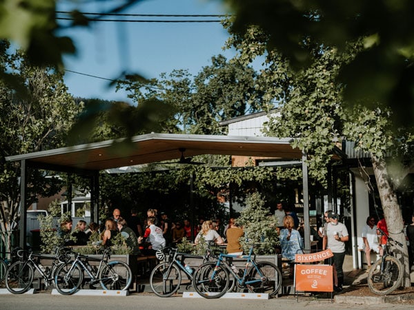 front view of Sixpence Coffee filled with customers