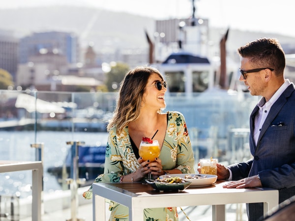 Couple having a drink at The Story Bar at MACq 01 Hotel in Hobart