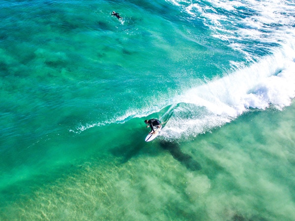 Man surfing in Avalon Point Mandurah