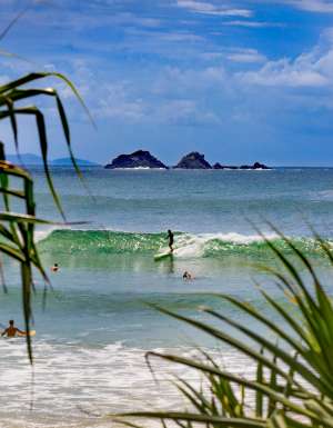 surfing at Wategos Beach, Byron Bay