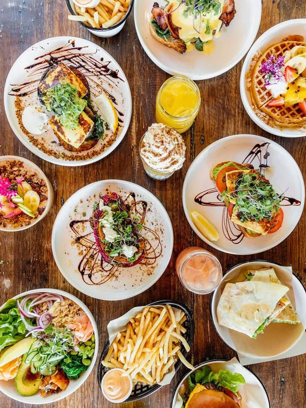 a spread of food on the table at Dune Cafe, Gold Coast