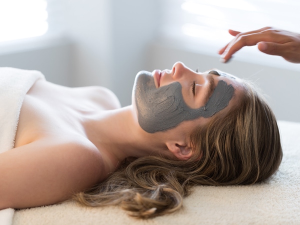 a woman taking a spa treatment