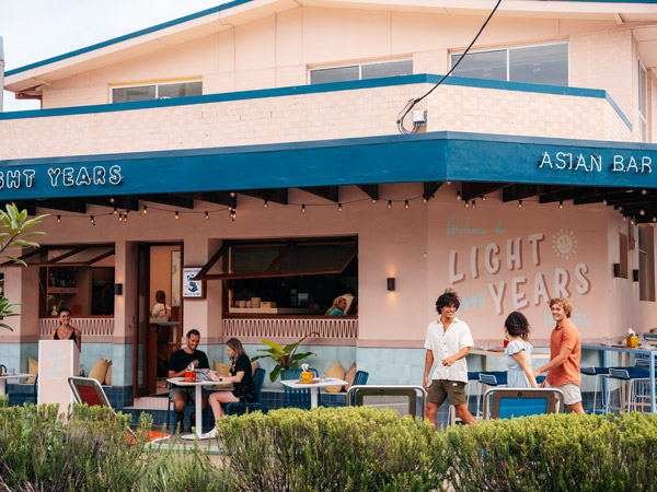 people chilling outside Light Years, Burleigh Heads