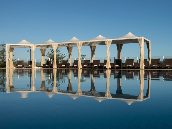 sunlounges by the pool at Sofitel Gold Coast Broadbeach