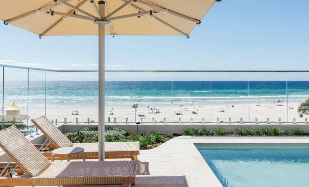beach views by the pool at Kirra Point Holiday Apartments