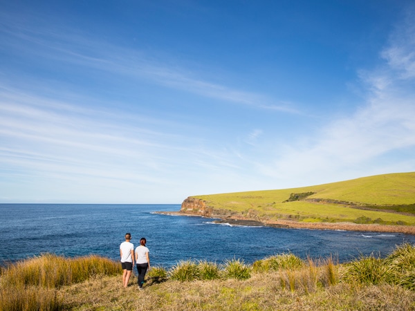 a couple enjoying a walk along the Kiama Coastal Walk on the South Coast