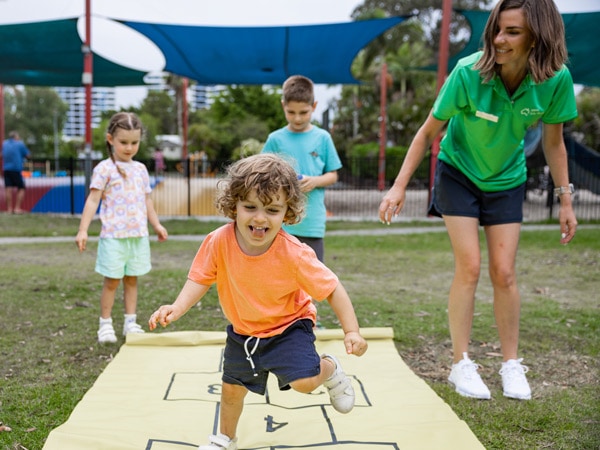 a little boy having fun while playing at Treasure Island Resort