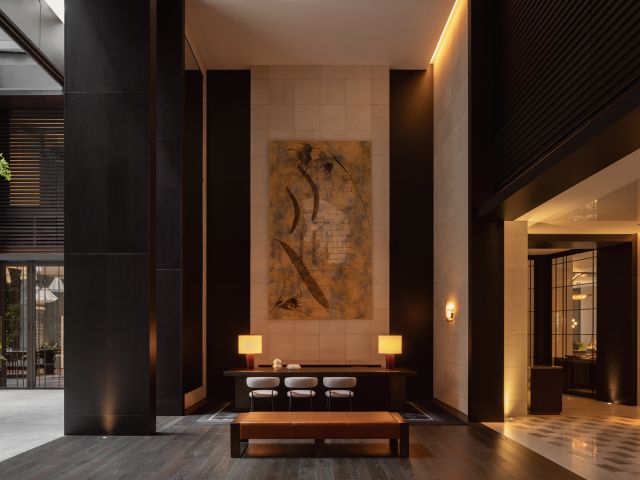 A modern hotel reception with high ceilings