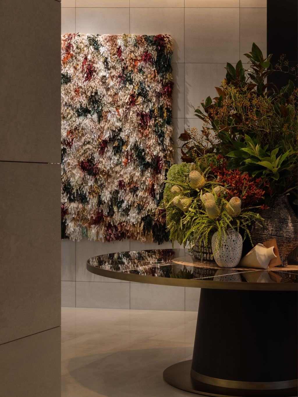A large bouquet of Australian native flowers sitting on a table.