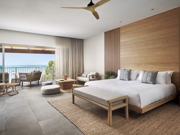 an expansive bedroom with balcony at Samphire Rottnest