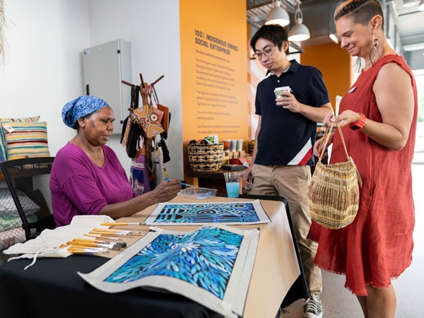 guests visiting an indigenous art gallery at Aboriginal Bush Traders
