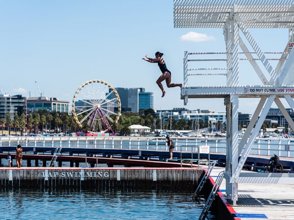 a person jumping off the Geelong waterfront