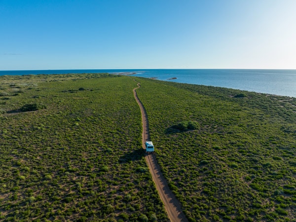 a car driving along Mackerel Islands