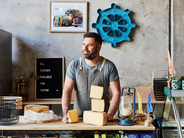 a cheese guy at Boatshed Cheese