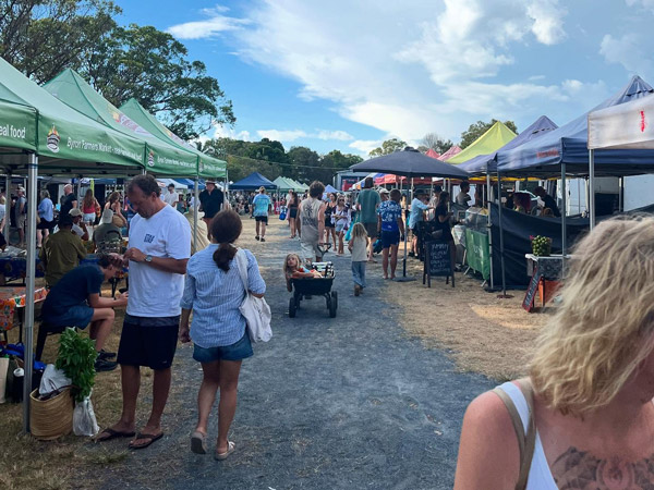 people perusing the stalls at Byron Farmers Market