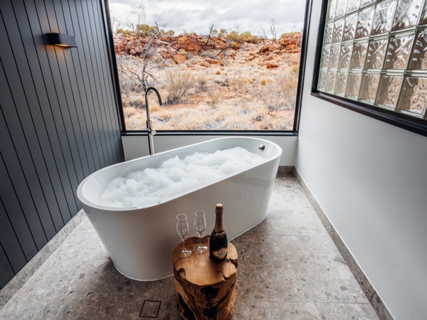 a deluxe suite with bathtub