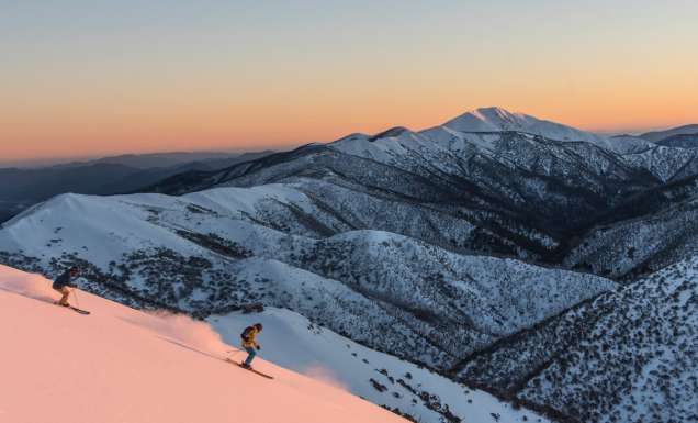 Skiers heading down slopes at Mount Hotham in Victoria