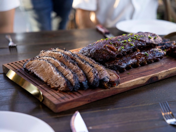 a steak dish on the table at Low n Slow Meat Co. 