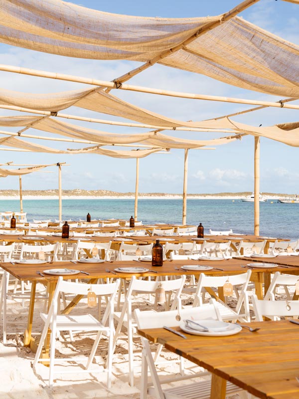 dining tables and chairs by the beach during the Shore Leave Festival