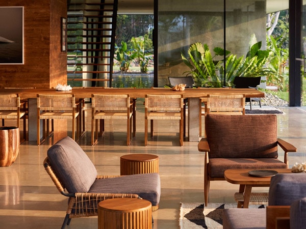 rustic chairs with cushions at Soma, Byron Bay