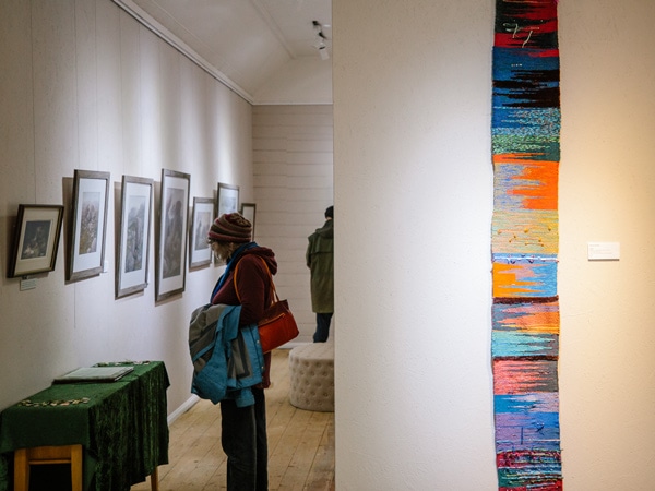 a woman exploring an art gallery