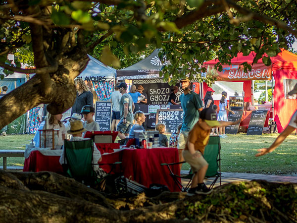 a stall under a tree at Byron Twilight Market