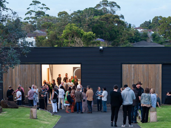 crowds of people gathering up at Seven Marks Gallery