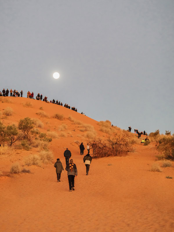 Sand dune surfing at the Birdsville Big Red Bash in Queensland's Simpson Desert