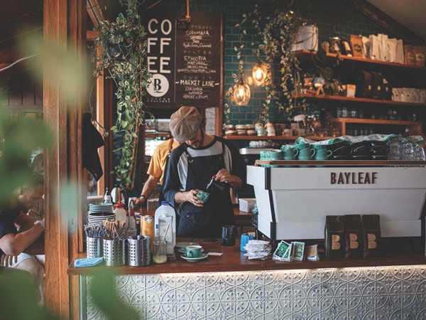 Barista making coffee at Bayleaf in Byron Bay