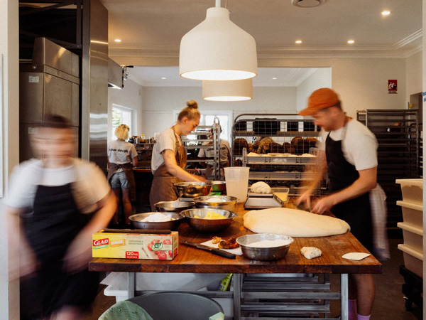 the staff busy in the kitchen at Slow Dough, Kiama restaurants