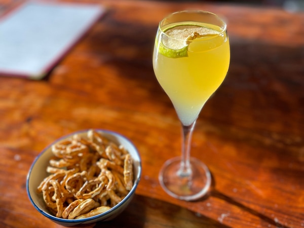 a glass of mulled wine with a snack at Frisk Small Bar