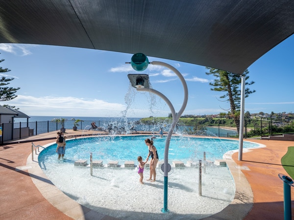 kids having fun at the pool in Surf Beach Holiday Park Kiama